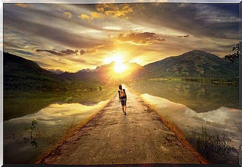 Man walks on deserted road