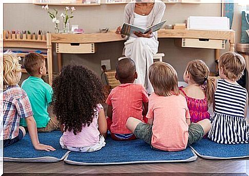 Teacher reads to her students