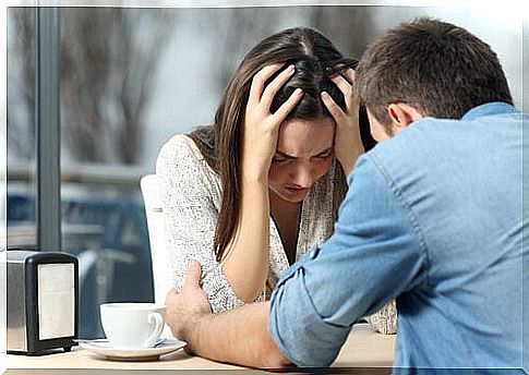 Boy and girl talking with the girl bent over in frustration as a form of indirect language