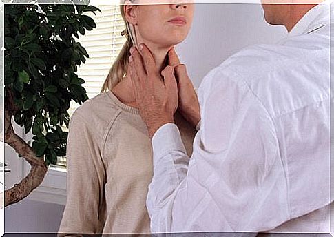 Woman having her throat examined