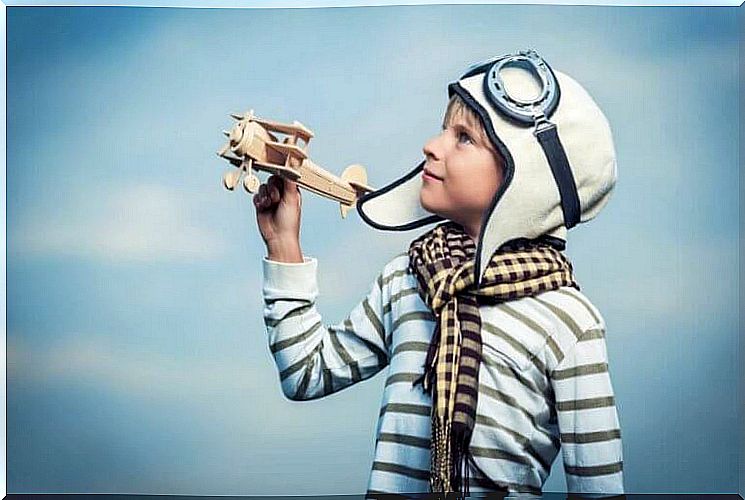 A boy pretending to be a pilot