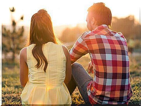 Couple sitting next to each other